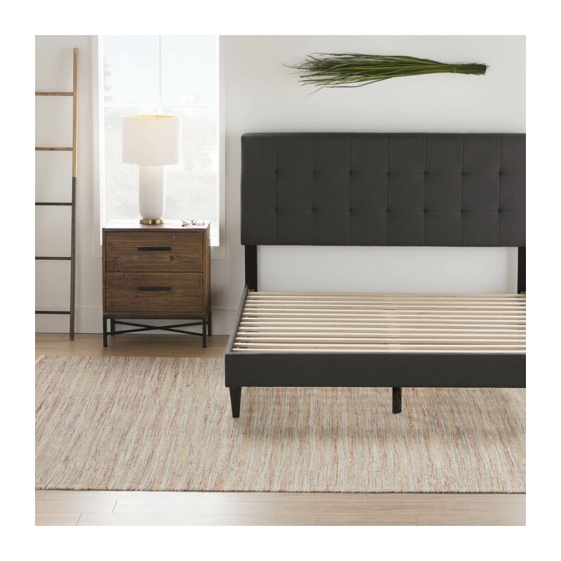 Cama con plataforma de perfil bajo y tapizado de madera maciza